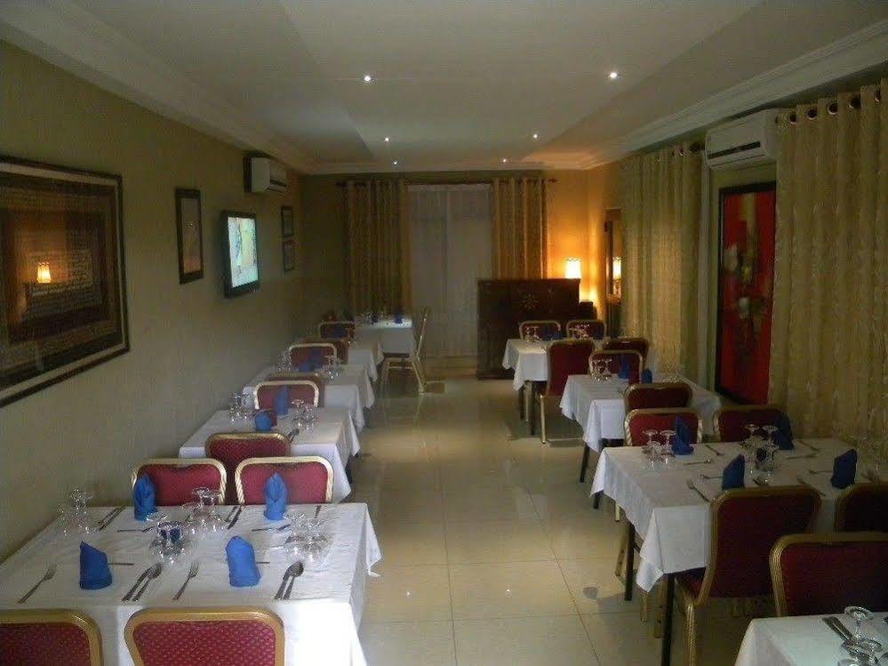 Hotel Residence Flamani Lomé Exterior photo